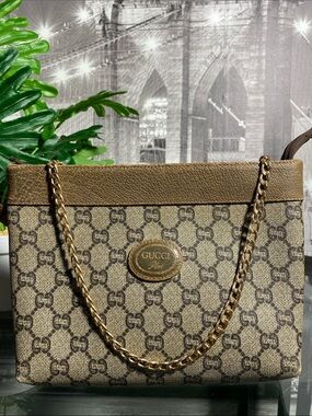 Authentic Gucci GG Plus Vintage Pouch Clutch bag